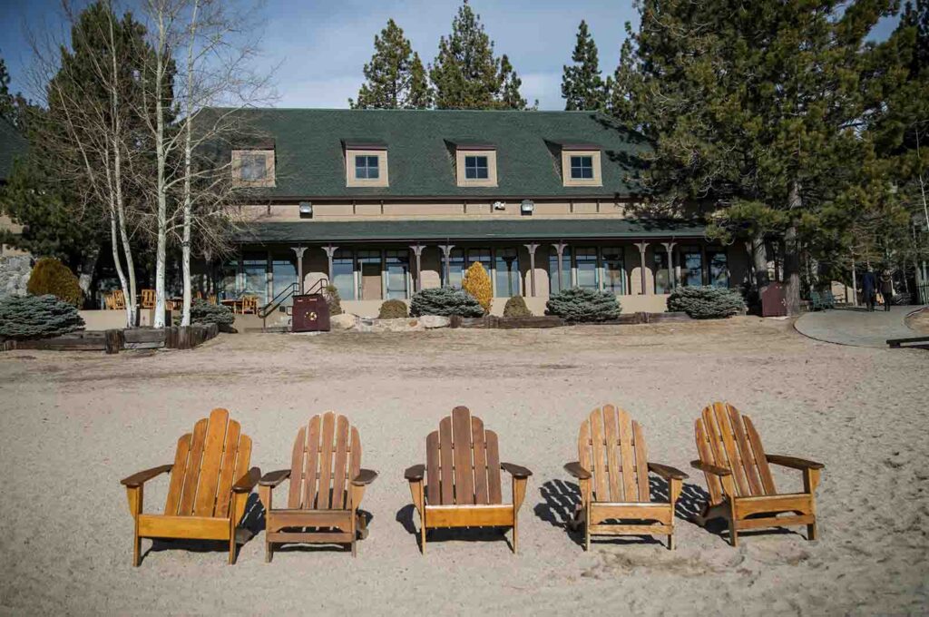 Tahoe chairs in front of Home on beach